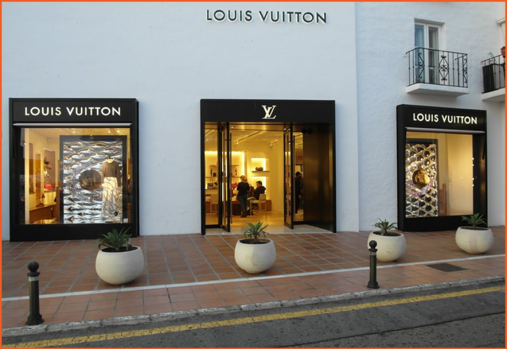 Detail of brand logo of a shop of Louis Vuitton, Marbella, Spain